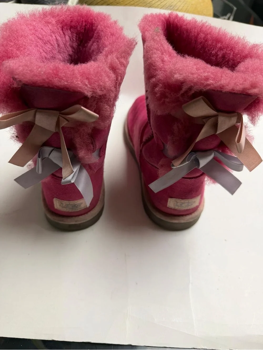 UGG Kids Fuchsia Suede Shearling Boots. They are a bit dirty on the back.